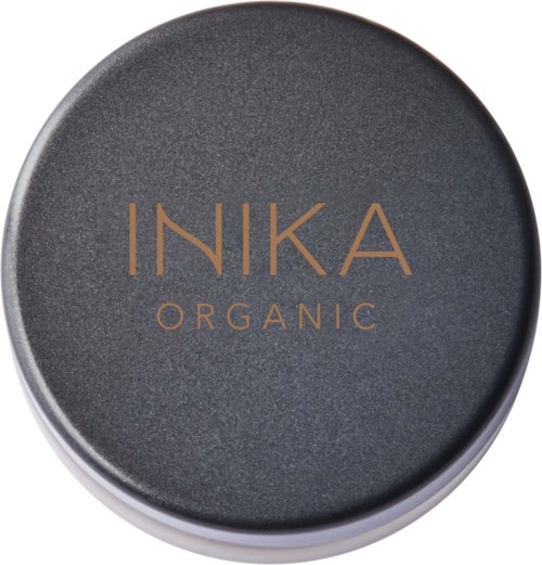 Ett runt mörkgrått lock med orden "INKA ORGANIC" i brunt. Det ser slätt ut med en enkel design.