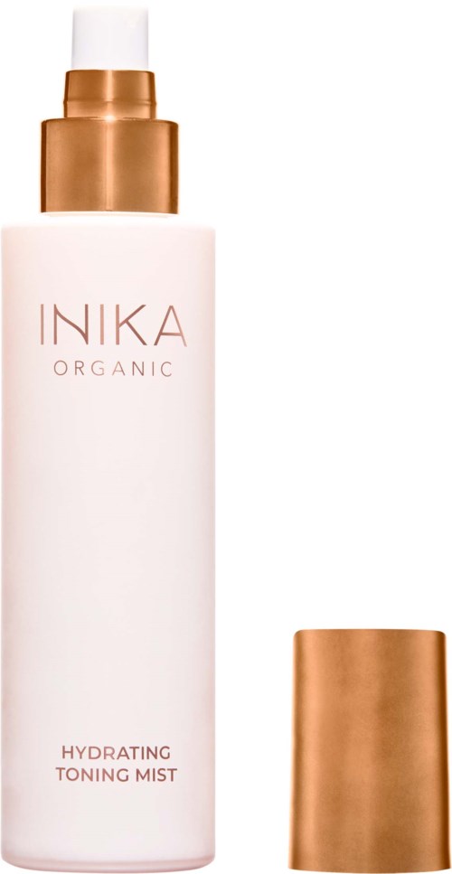 En hvit flaske med gullhatt og spraymunnstykke, merket 'INKA ORGANIC Hydrating Toning Mist'.
