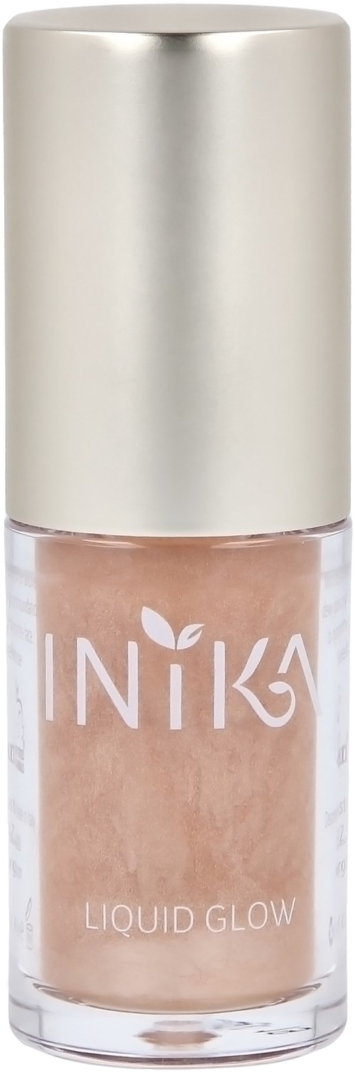 En flaska med Inika Liquid Glow med beige vätska och silverkapsel.