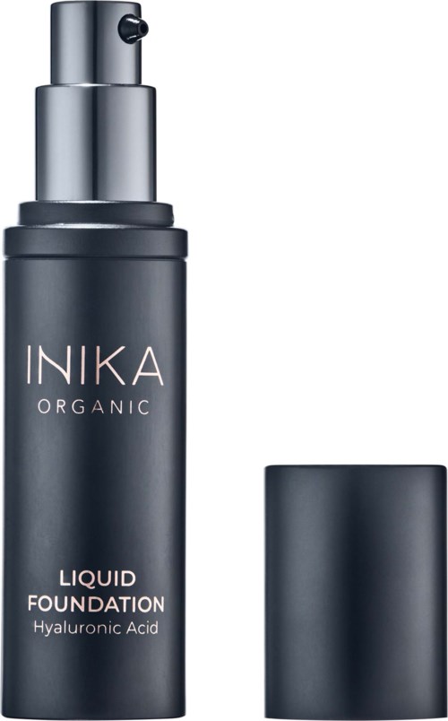 Czarna butelka z pompką i nakładką, oznaczona INIKA Organic Liquid Foundation z kwasem hialuronowym.