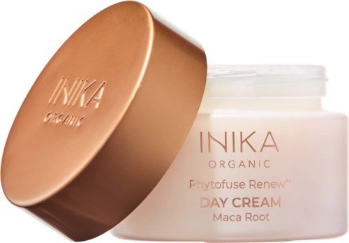 En burk med Inika Organic Phytofuse Renew Day Cream med ett delvis borttaget guldkapsel.
