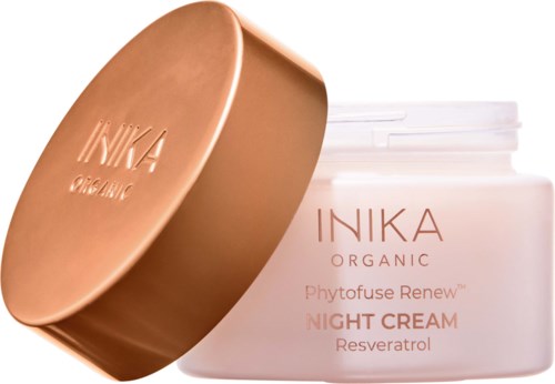 Valkoinen purkki, jossa on kuparinen kansi, sisältää INIKA Organic Night Cream with Resveratrol. Kansilevy on poistettu.