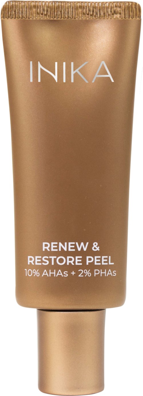 En guldfärgad tub med INIKA:s hudvårdsprodukt märkt 'Renew & Restore Peel' med 10% AHA och 2% PHA.