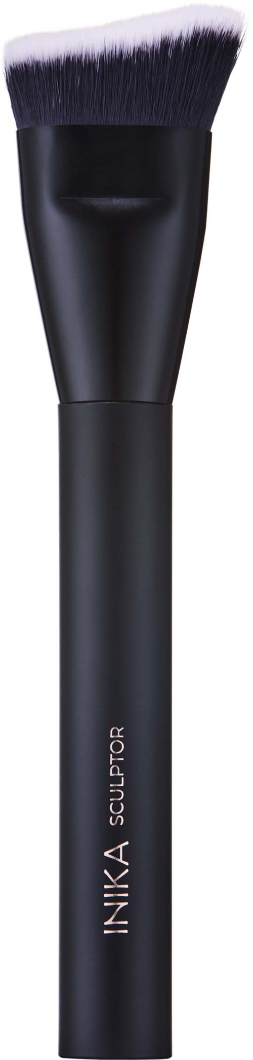 A black makeup brush with soft bristles and the word "Sculpt" on its handle.