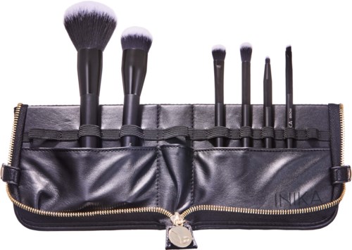 A black makeup brush set in a zippered case, with different sizes for face and eye applications.