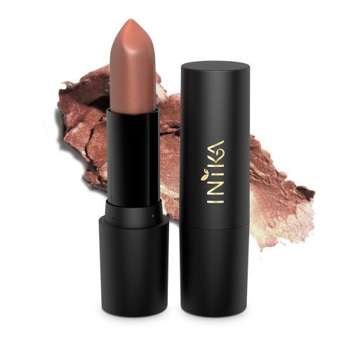 A nude lipstick in a black case with the brand name 'INKA' on it, and swatch of makeup behind.