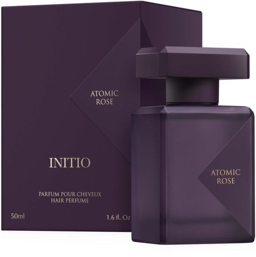 Dark purple box and bottle for Initio Atomic Rose hair perfume. Elegant and sleek design for luxury fragrance.