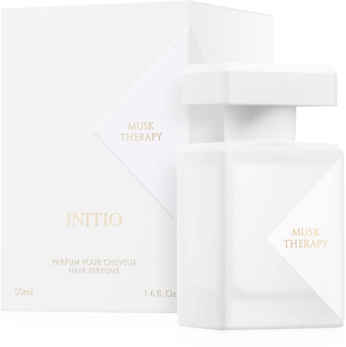 White box with gold text and a perfume bottle labeled 'INITIO Musk Therapy' and 'Parfum pour cheveux.'