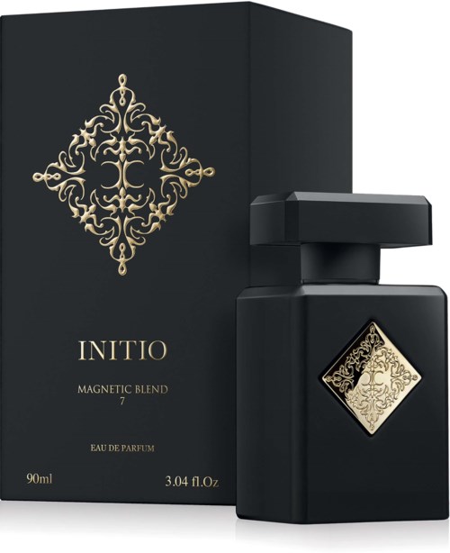 A black perfume bottle with a gold decorative label and a matching black box with gold design.