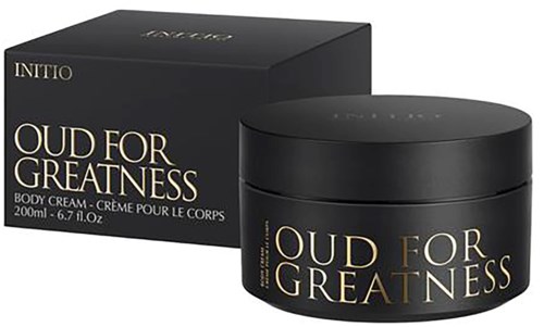 Black jar and box with gold and white text, labeled 'Oud for Greatness' body cream by Initio.