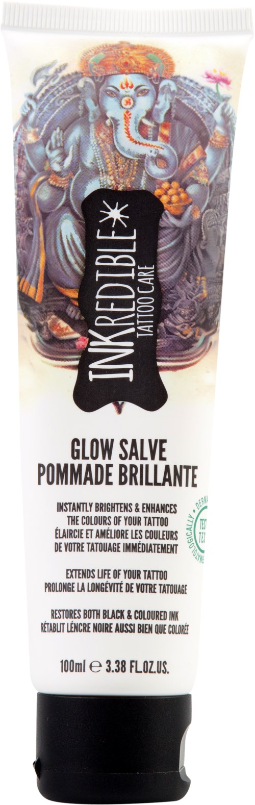 En tub med glowsalva med en färgglad Ganesha-figur och svartvitt design på etiketten.