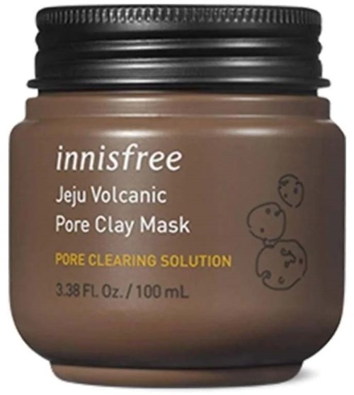 A brown jar with a black lid, labeled 'Innisfree Jeju Volcanic Pore Clay Mask', showing a small illustration of the Earth.