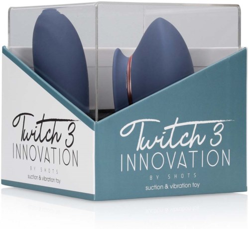 Torba w kolorze teal z dwoma niebieskimi przedmiotami w środku, oznaczona 'Twitch 3 INNOVATION' i 'by Shots'.