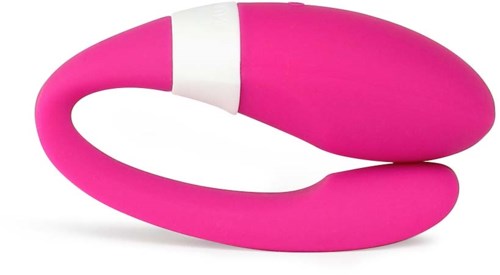 Ein pinkes, gekrümmtes Objekt mit weißer Spitze, wahrscheinlich ein Massagegerät oder Vibrator.