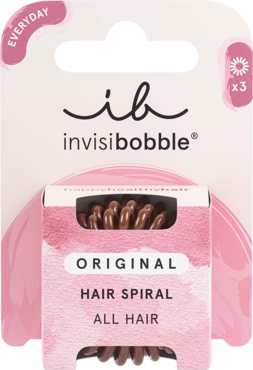 Emballasjen har lyserøde og hvide farver med mærket 'invisibobble' og viser hårspoler indeni.