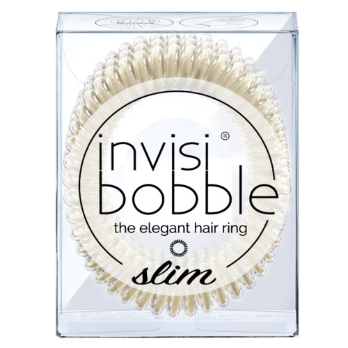 Ett genomskinligt litet förvaringspaket med en guld hårring inuti, märkt 'invisibobble slim' och beskrivning 'det eleganta hårbandet.'
