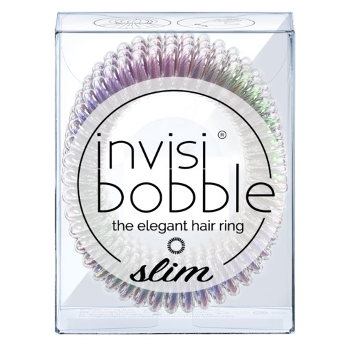 En tydlig låda med ett färgglatt, spiralformigt hårband inuti. Etiketten säger "invisibobble slim" och "det eleganta hårbandet."