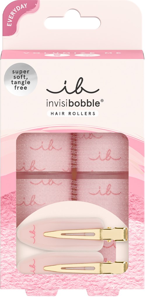 Roze haarrollers met gouden clips in een doorzichtige doos, gemerkt als "invisibobble" en "everyday".