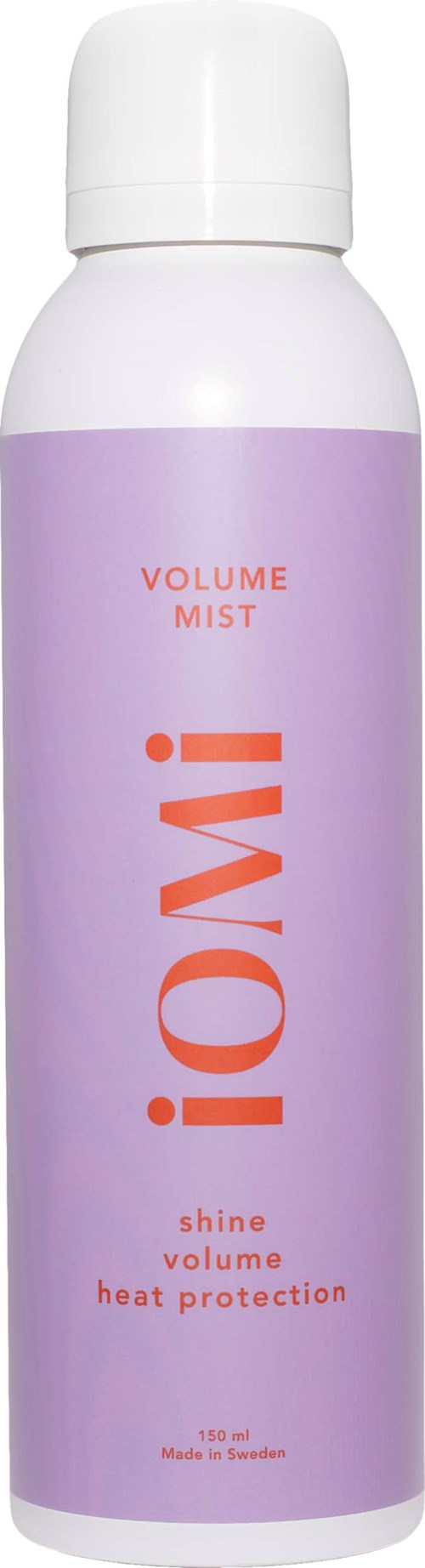En hvit og lilla spraydunk merket 'Volume Mist' for glans, volum og varmebeskyttelse.
