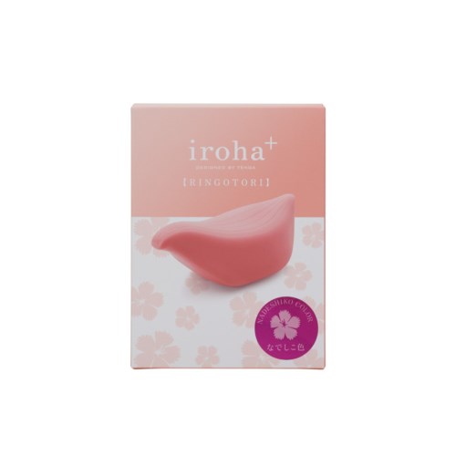 Esken har en rosa skjønnhetspute og japansk tekst med blomstermønster og lilla stempel på rosa bakgrunn.