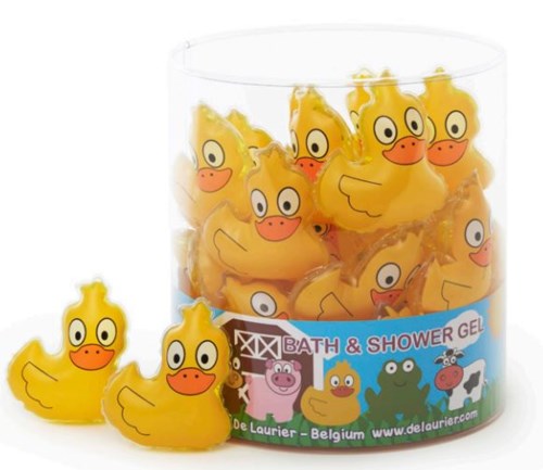 Små gula gummiduvor med tecknade ansikten och stora ögon i en genomskinlig behållare. Några är utanför behållaren.