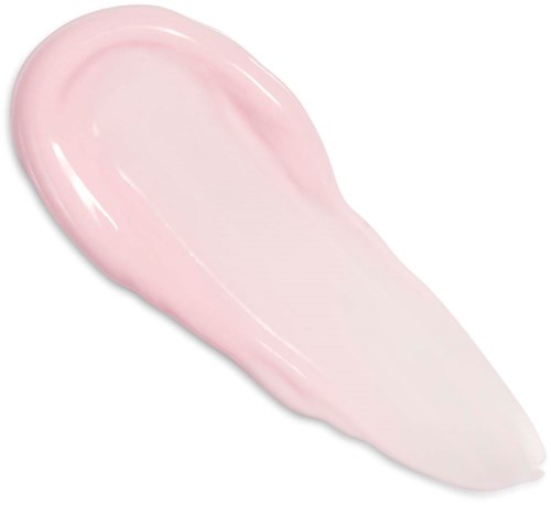 Vaaleanpunertavaa kerma valkoisella taustalla, levitetty pisaran muotoon.
