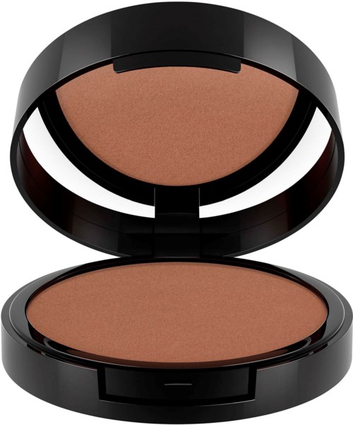 A compact, open makeup foundation with a mirror inside the lid, featuring a peach-colored powder.