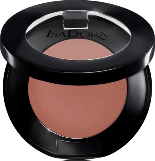 Ett kompakt sminkprodukt med rouge eller puder inuti, märkt ISADORA, i ett runt svart fodral.