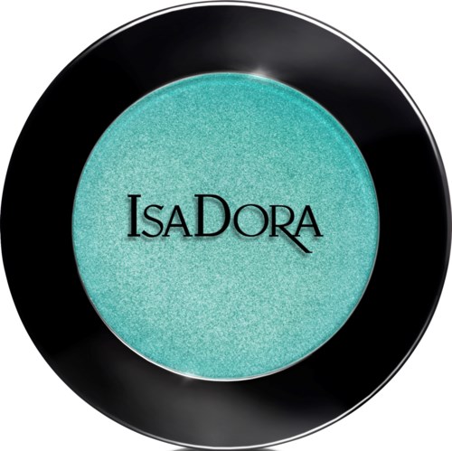 Ett turkost ögonskugga i ett svart rund sminkfodral med 'Isa Dora' branding.