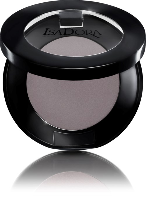 En rund, svart kompakt med grått puder inuti och märket 'ISADORA' på locket.
