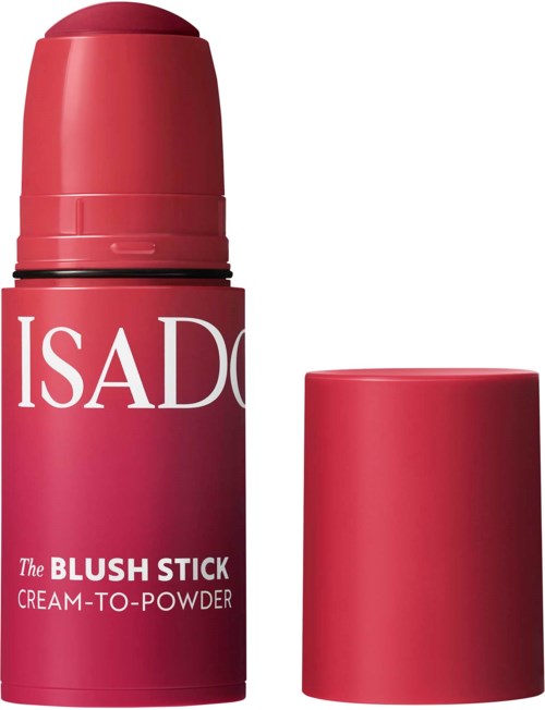 Red stick deodorant with a pink cap, labeled ISADO The BLUSH STICK CREAME-TO-POWDER.