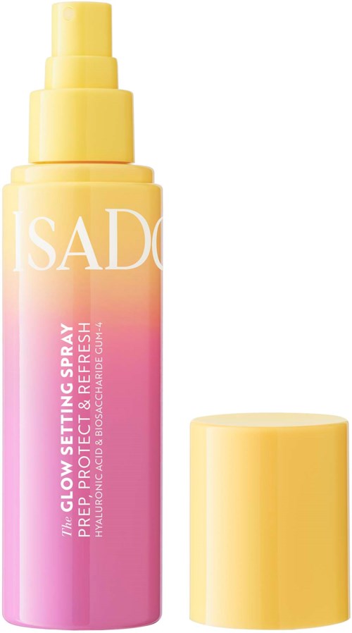 Isado Glow Setting Spray -pullo, vaaleanpunainen ja keltainen väri, suihkepää irrotettu.
