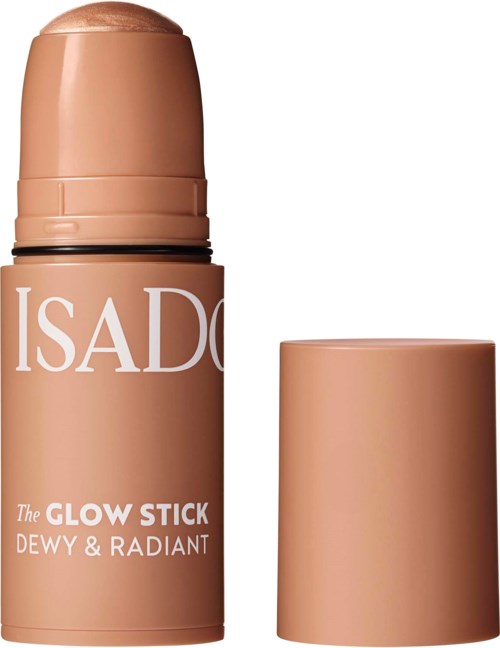 Ett beige-färgat rullande produkt med matchande lock, märkt ISAD som The Glow Stick Dewy & Radiant.