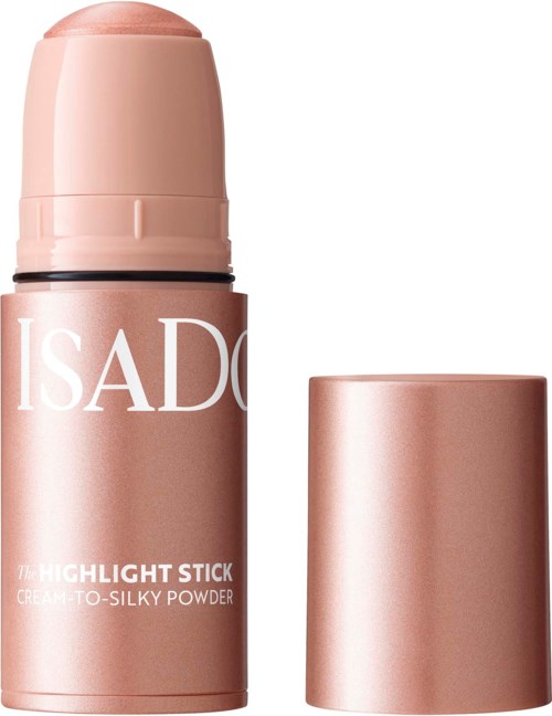 En roséguldsmakeup-stift med avtagbart lock, märkt Isado Highlight Stick, krämig till silkeslen textur.