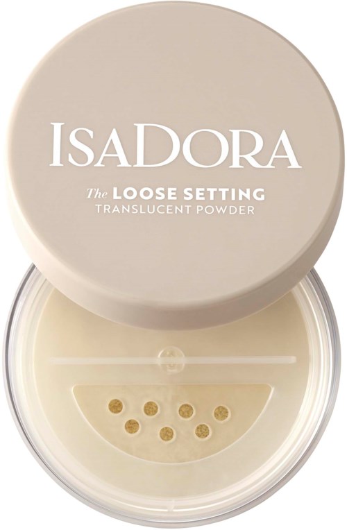 En rund behållare med Isadora lös uppluckrad genomskinlig puder, med hål för att hälla ut. Locket har vit text.
