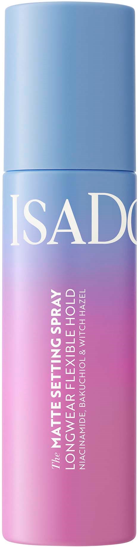 Pitkä suihkepullo, jossa vaaleanpunainen ja sininen gradientti, nimeltä 'ISADORA' ja 'Matte setting spray' meikin viimeistelyyn.