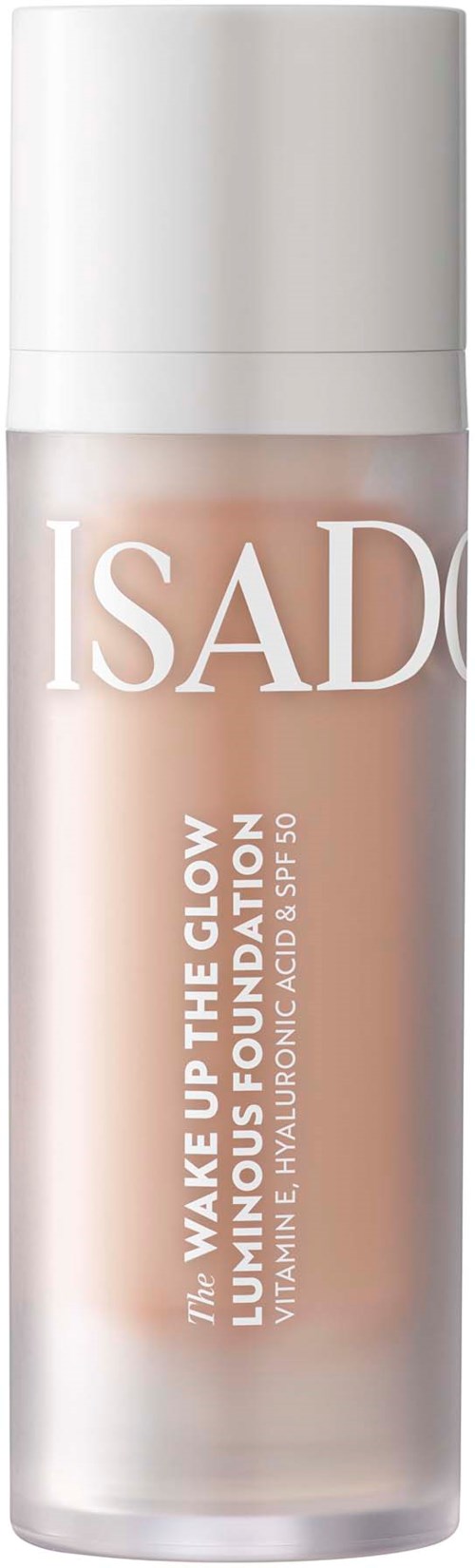 En flaske med Isadora glow foundation med hvid låg og lys væske indeni.