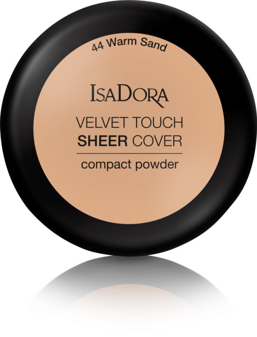 Detta är en rund makeup-kompact märkt IsaDora Velvet Touch Sheer Cover i varm sandfärg.