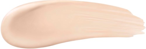 A beige cosmetic cream spread out with a smooth texture on a black background.