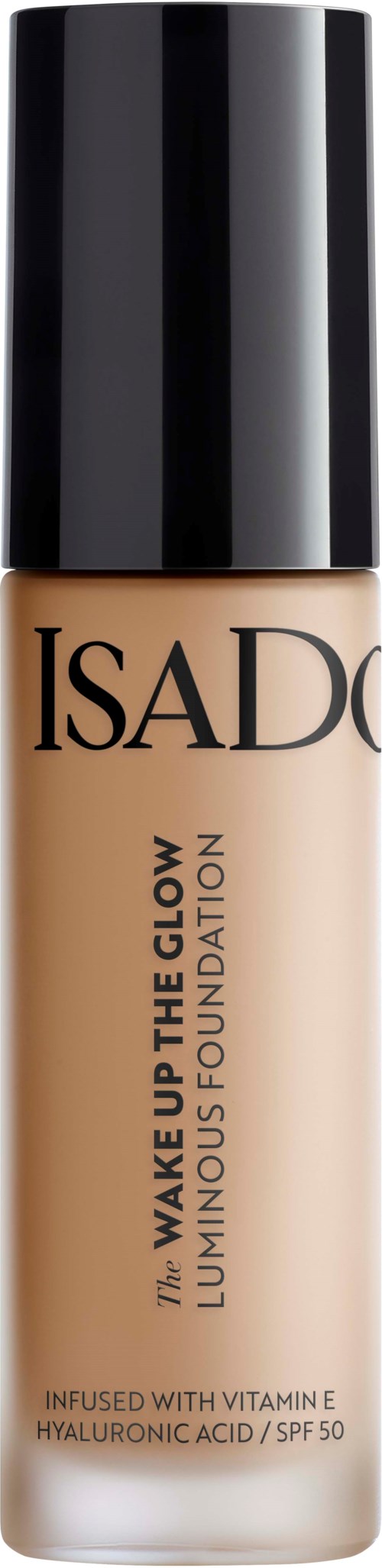 En flaske med IsaDora foundation med svart lokk, merket 'Wake Up The Glow' og nevner vitamin E og SPF 50.
