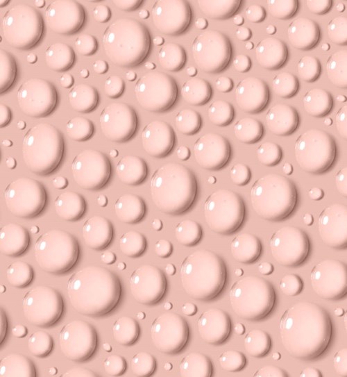 En rosa bakgrund fylld med olika stora upphöjda sfärer som skapar ett 3D-texturerat mönster.