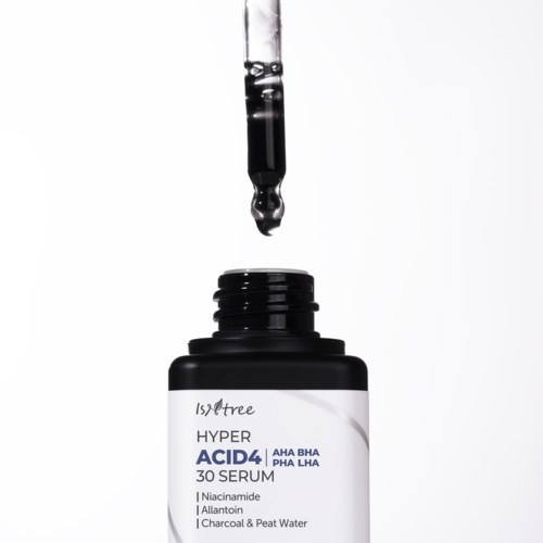 En dropper over en svart flaske merket 'Hyper Acid 4' serum med ingredienser oppført nedenfor.