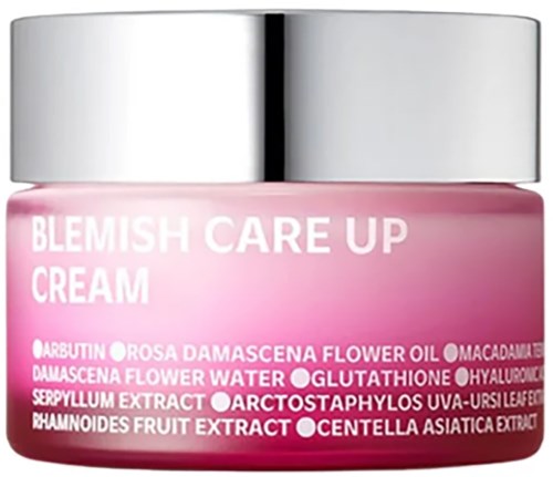 En rosa krukke med blemish care-krème og sølvlåg, med naturlige planteekstrakter og blomsteroil.