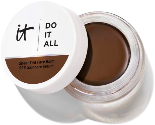 En krukke med Sheer Tint Face Balm med brunt farget balm inni og et hvitt lokk med svart og brunt tekst.