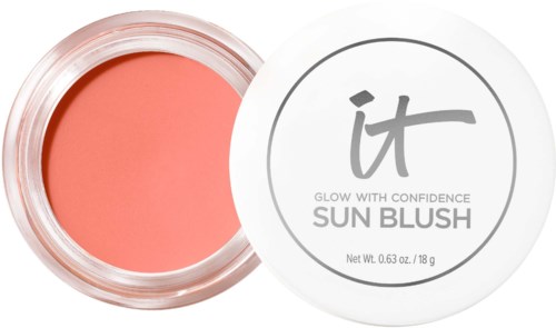 A small round container with pink sun blush inside, labeled with a white lid that says "it" and "Sun Blush."