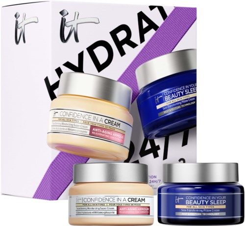 Two jars of night creams and a box with large bold letters and a purple stripe.
