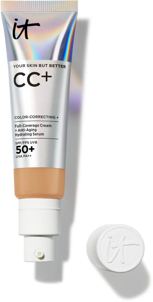 En tube CC-cream med låg lige ved siden af, mærket som farvekorrigerende, med SPF 50+ til beskyttelse af huden.