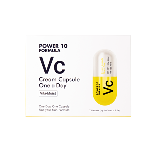Ett box visar en vitaminkapselprodukt som heter Power 10 Formula, med information om ett kapsel per dag och hudfördelar.