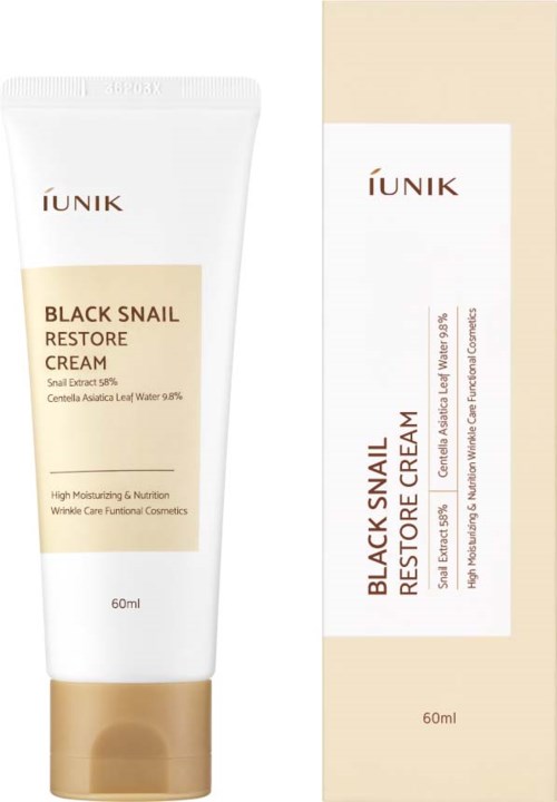 Een witte tube met 'Black Snail Restore Cream' naast een beige doos met vergelijkbare tekst, beide zijn huidverzorgingsproducten.