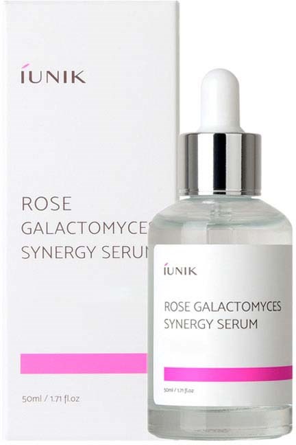 A skincare serum in a clear bottle with a dropper, labeled 'Rose Galactomyces Synergy Serum,' with a white box.